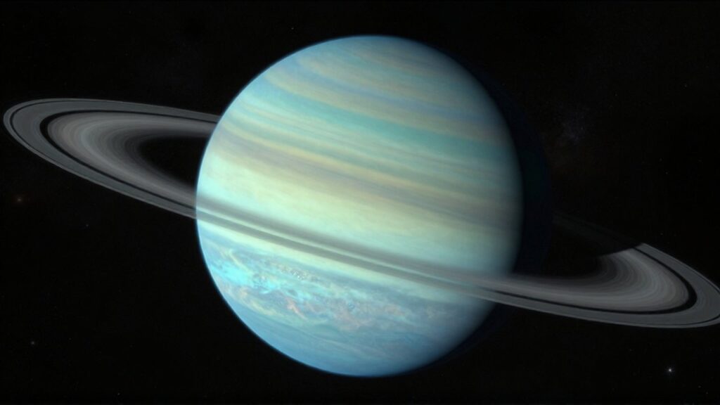 Primer plano del planeta Urano mostrando su atmósfera azul claro